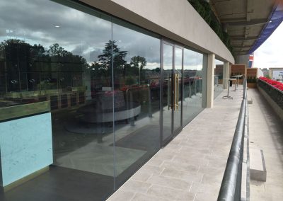 Frameless Structural glazing system to create a seamless finish of the extensive window and entrance